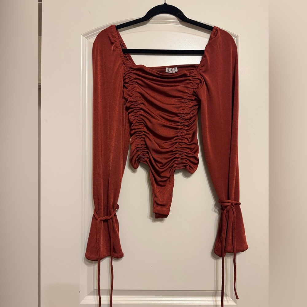 Free People Meant to be Ruched Cherry Chai bodysuit. Size extra small.